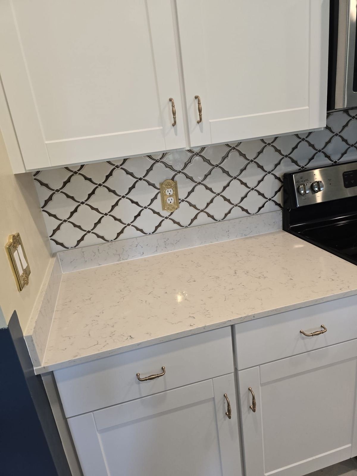 Quartz countertop and arabesque tile backsplash installation Cape Coral FL