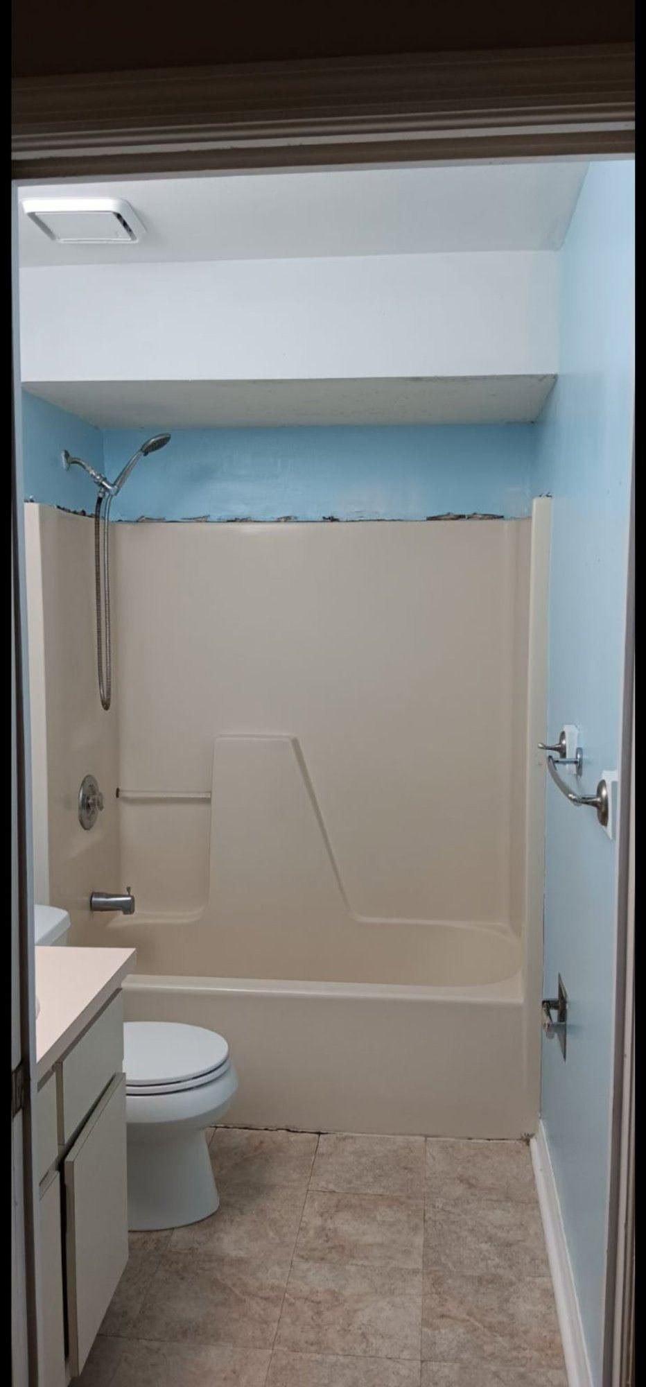 Outdated bathroom with fiberglass tub surround before remodel Southwest Florida